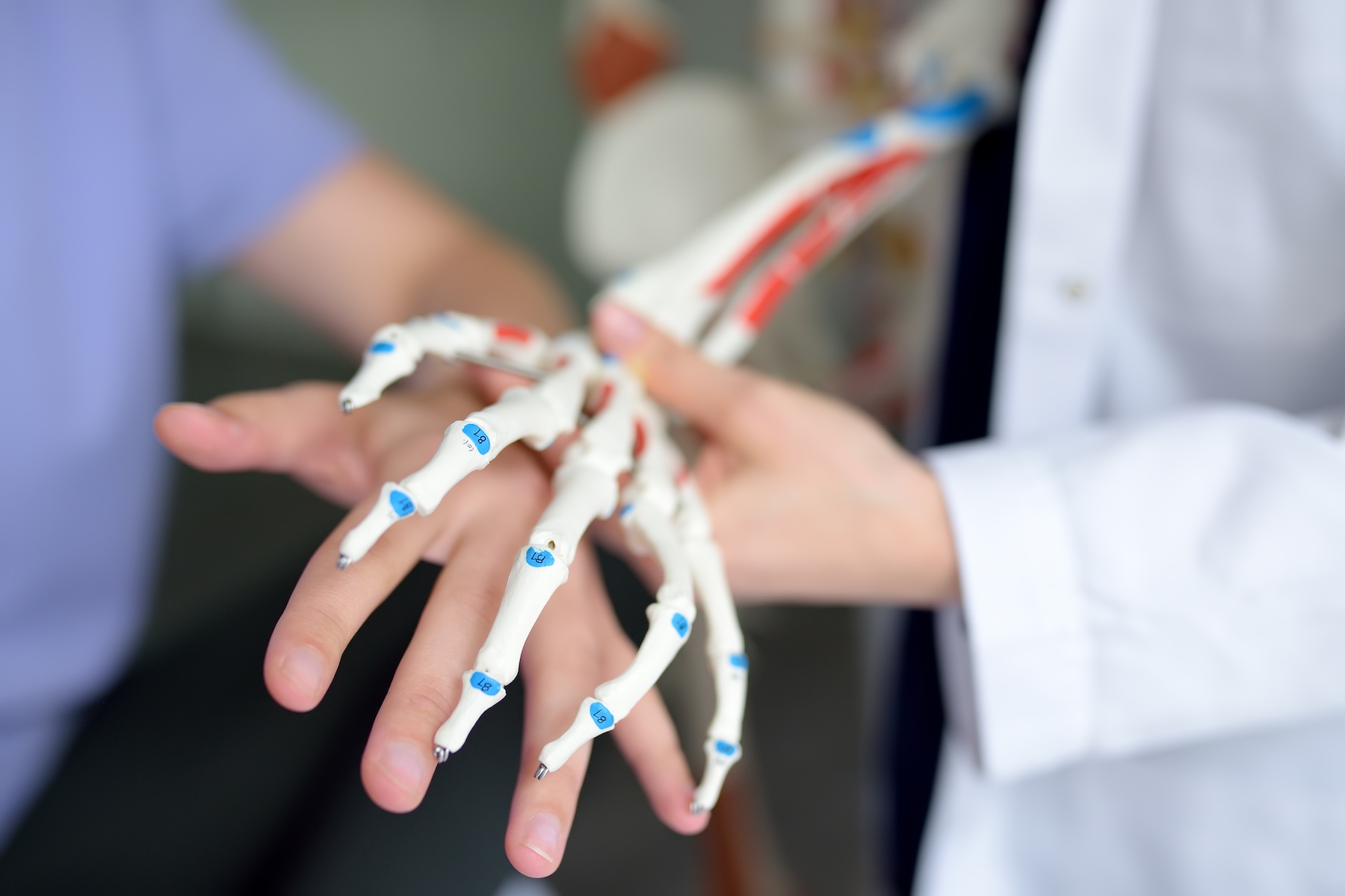 Musculoskeletal doctor addressing wrist pain at Panacea Health, London